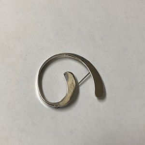 Sterling silver pin.